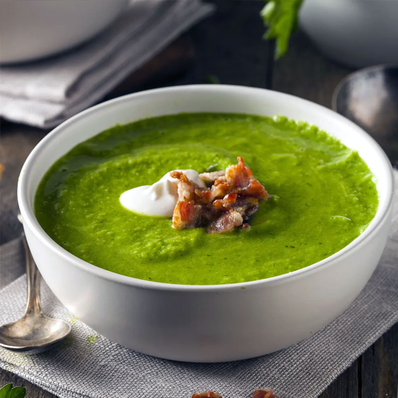 Creamy Potato Spinach Soup in a rustic bowl